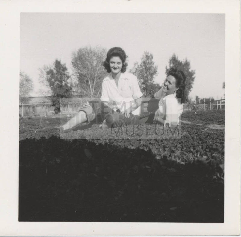 Two Ladies Posing on the Grass