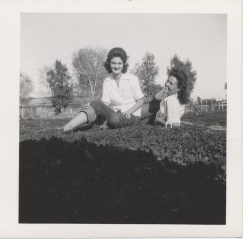 Two Ladies Posing on the Grass