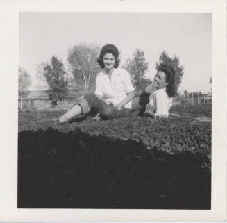Two Ladies Posing on the Grass