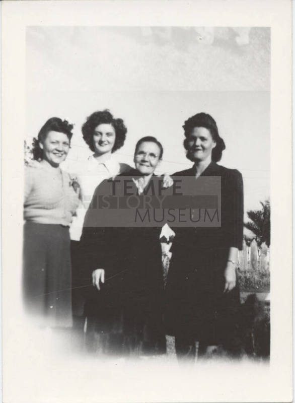 Four Ladies Standing Together