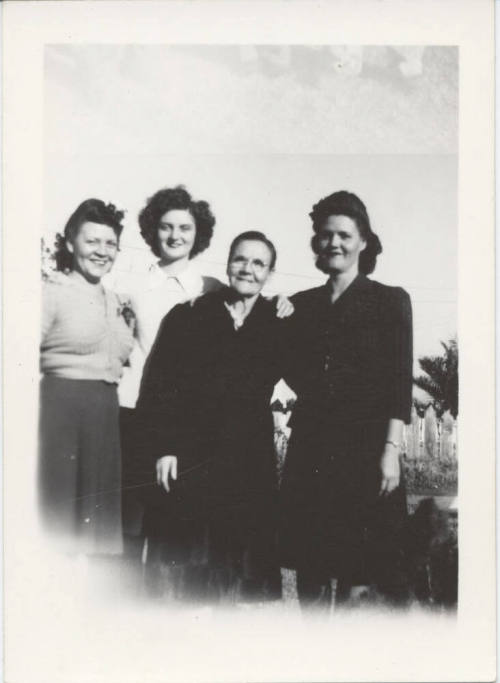 Four Ladies Standing Together