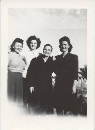 Four Ladies Standing Together