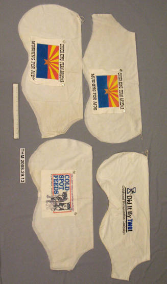 Four of Chuck King's Iditarod dog bibs