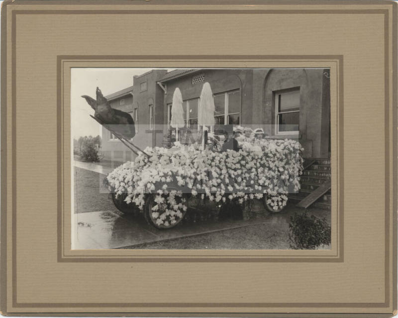 Parade Float of Automobile with Flowers
