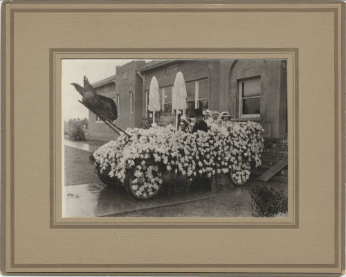 Parade Float of Automobile with Flowers