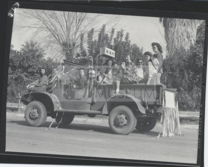 Women in Parade Truck