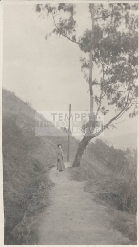 Unidentified Woman Standing on a Trail