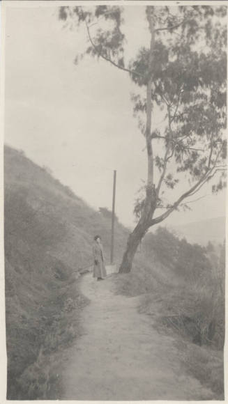 Unidentified Woman Standing on a Trail