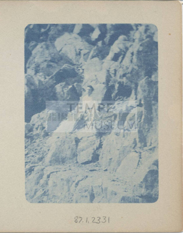 Unidentified Woman Standing on a Rock