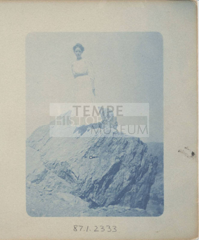 Unidentified Woman Standing on a Rock