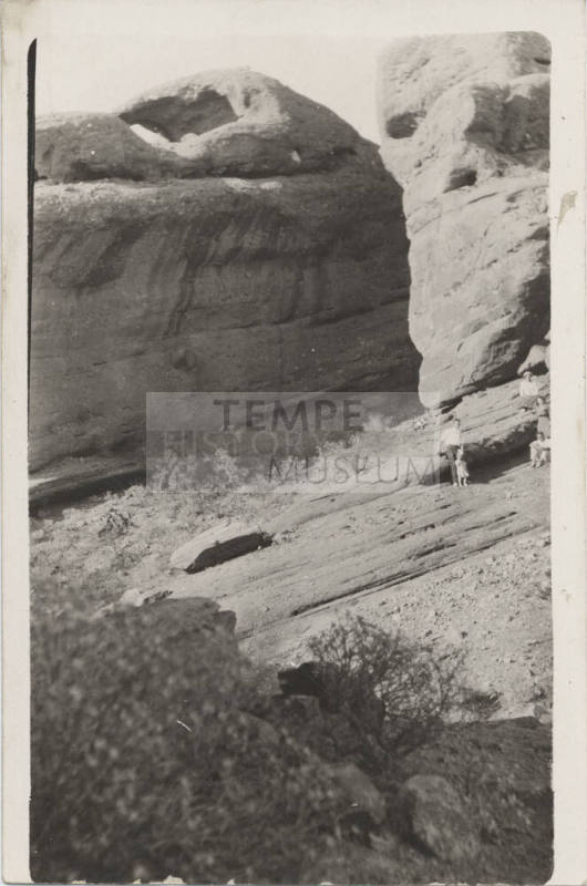 View of People by a Rock Formation, AZ