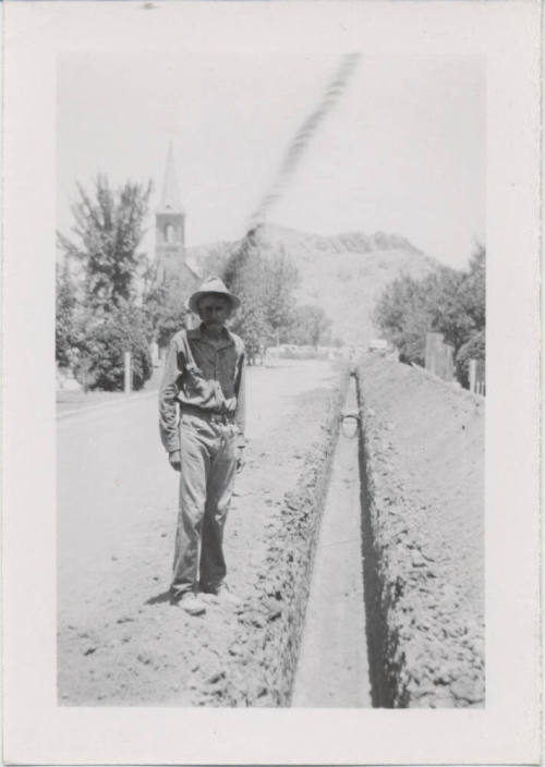 Man Next to Trench on College Avenue