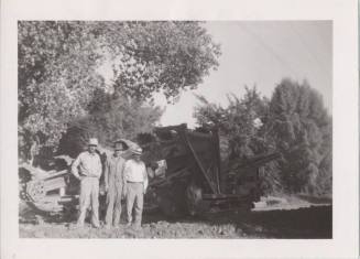3 Men in Front of Trenching Machine