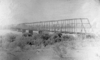 Photograph, Black and White--8 x 10", Side view of railroad bridge