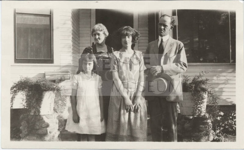 Dr. Alexander with Unidentified Family