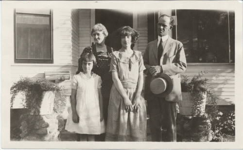 Dr. Alexander with Unidentified Family