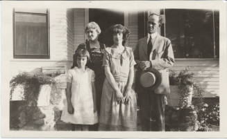 Dr. Alexander with Unidentified Family