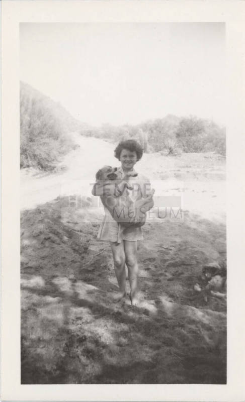 Betty Allen Standing Holding Dog Sandy