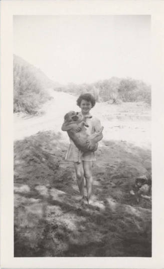 Betty Allen Standing Holding Dog Sandy