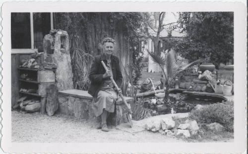 Guess Birchett Seated Beside Garden Pond