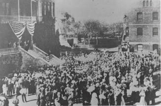 Theodore Rosevelt speaking from the steps of Old Main
