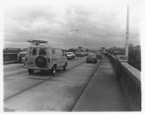 Cars on the Mill Avenue bridge