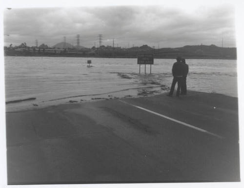 Car pool street sign  in flooded Salt River