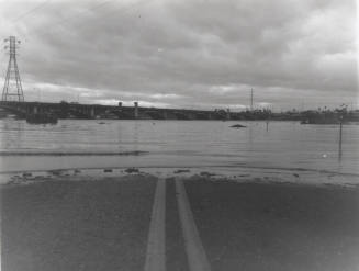 Road submerged by the flooded Salt River