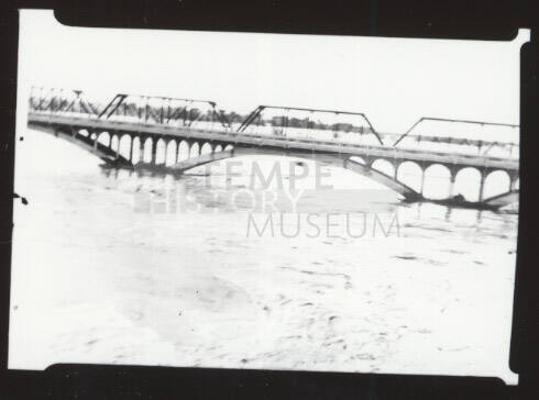 Salt River flood waters under the Ash Avenue and railroad bridges