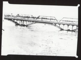 Salt River flood waters under the Ash Avenue and railroad bridges