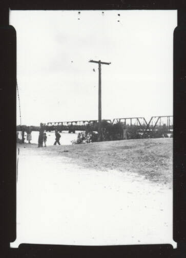 Railroad bridge and telephone pole