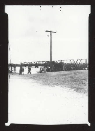 Railroad bridge and telephone pole