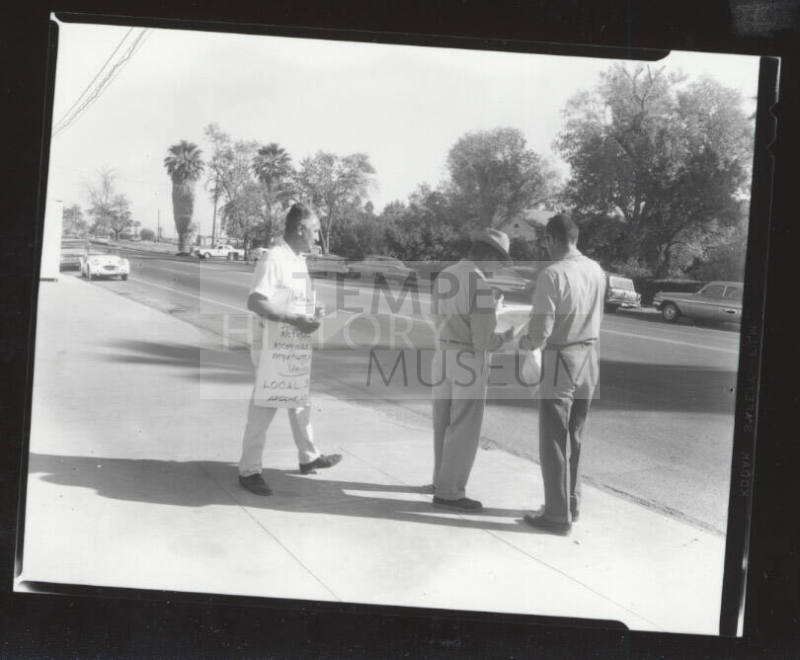 AFL-CIO union organizers on sidewalk