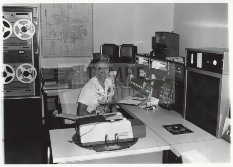 Pauline Hill Smith working in the Tempe Police Department radio room