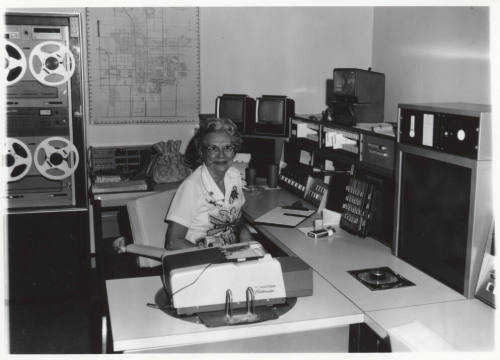 Pauline Hill Smith working in the Tempe Police Department radio room