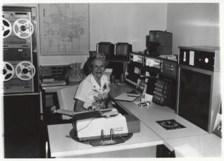 Pauline Hill Smith working in the Tempe Police Department radio room