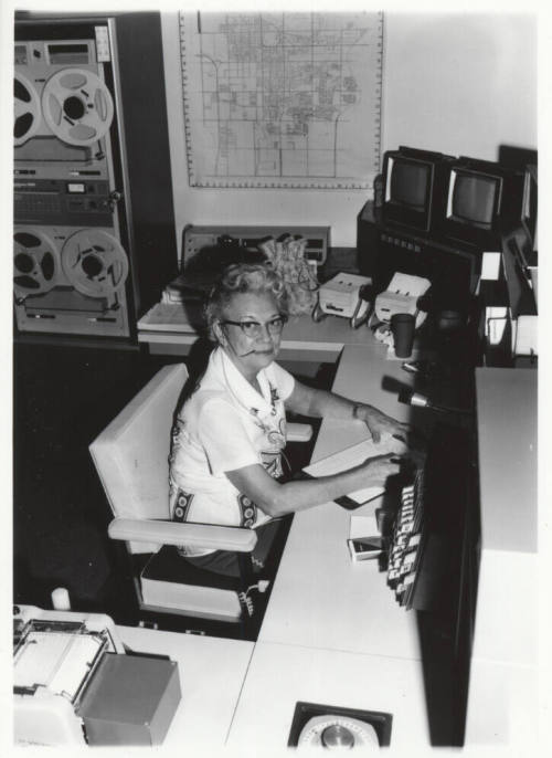 Pauline Hill Smith working in the Tempe Police Department radio room