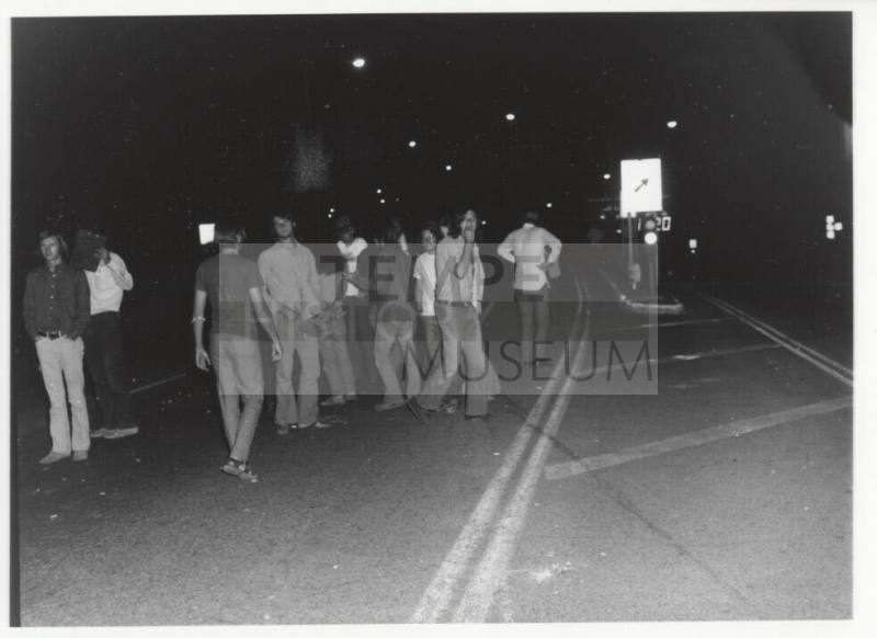 Demonstration march, 5-5-1971--Group of men blocking road lane at night