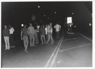 Demonstration march, 5-5-1971--Group of men blocking road lane at night
