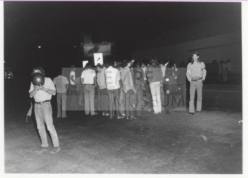 Demonstration march, 5-5-1971--Group of people clustered at night