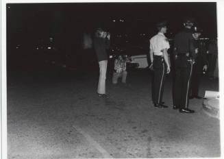 United Farm Worker's Gallo wine protest at Hayden Plaza--2 photographers photgraphing 3 policeman