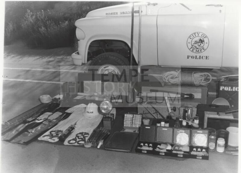 view of contents Tempe Police wagon on the ground