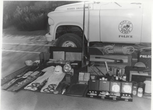 view of contents Tempe Police wagon on the ground