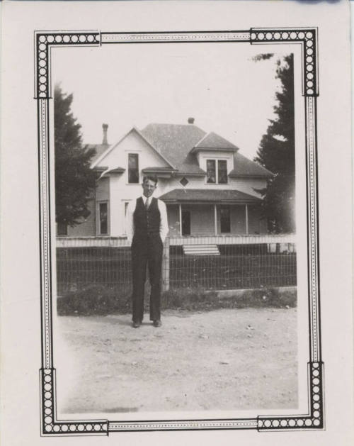 Willard Carter in Front of Residence