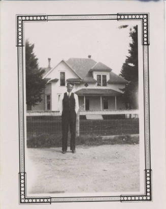 Willard Carter in Front of Residence