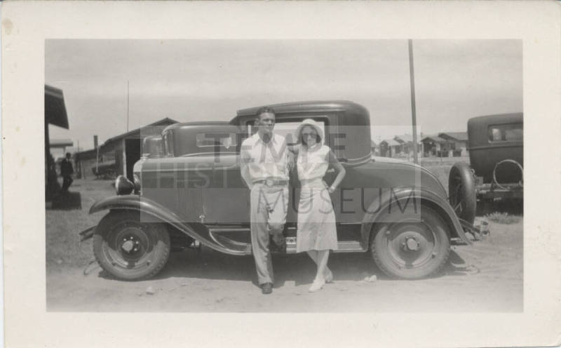 Everette and Sally Cummins by Automobile