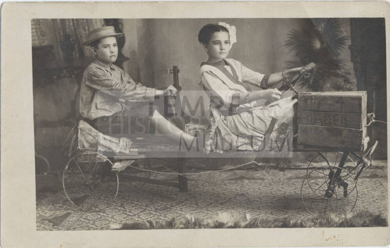 Portrait of Joe and Velma Dines on Bicycle