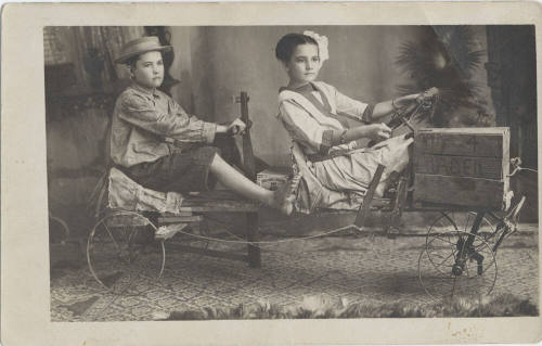 Portrait of Joe and Velma Dines on Bicycle