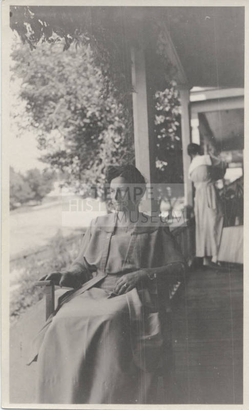 Estelle Hackett Sitting on a Porch