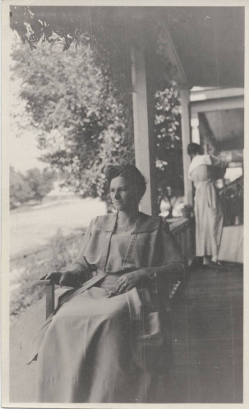 Estelle Hackett Sitting on a Porch